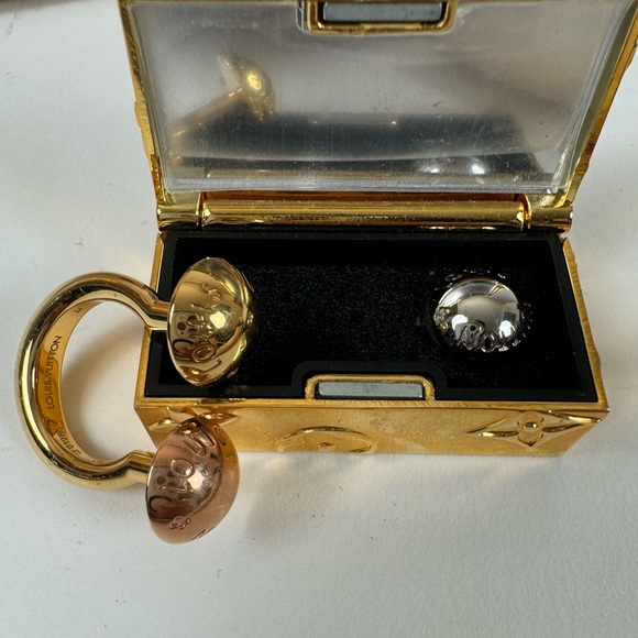 Louis Vuitton Jewelry - Louis Vuitton Ring; Style: Studdy - Interchangeable Studs, gently used. Size M.